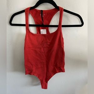 NEVER WORN Burnt Red Out From Under - Urban Outfitters Super Stretchy Body suit